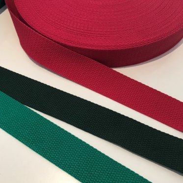 Gjordbånd og andre håndtag til tasker